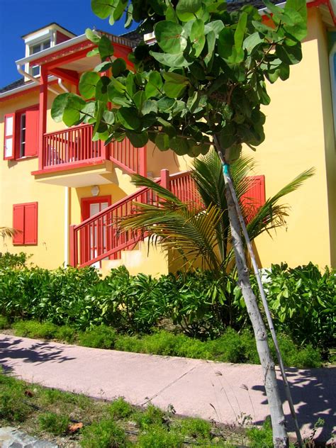 Cornsilk Yellow and Persimmon Orange exterior in St.Martin in the Caribbean | Orange paint ...