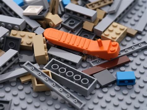 A Pile of Lego Pieces with a Brick Separator in it. Editorial Photography - Image of piece ...