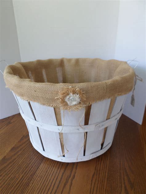 Bushel basket lined with burlap...boy, that was a learning experience ...