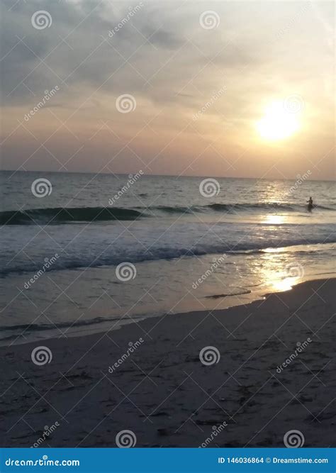 Pretty Beach Sunset stock photo. Image of pretty, beach - 146036864