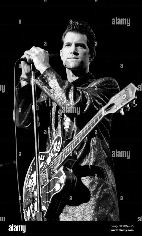 Chris isaak guitar Black and White Stock Photos & Images - Alamy