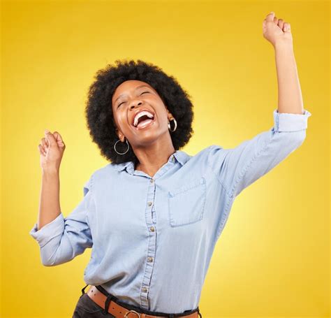 Premium Photo | Happy cheering and excited black woman with freedom ...