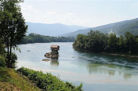 Lonely House Standing On Rock In River Of Serbia | Reckon Talk