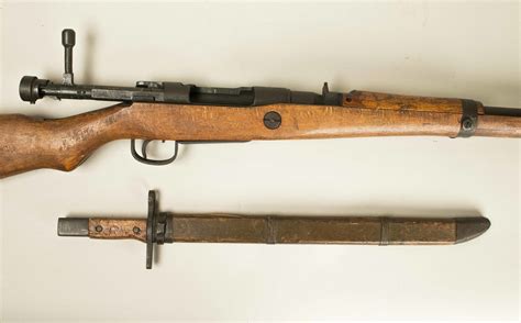 Late War Japanese Arisaka Rifle and Bayonet with chrysanthemum stamp. | Witherell's Auction House