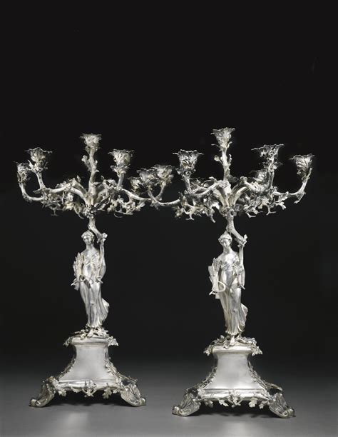 A pair of Victorian silver seven-light candelabra, Stephen Smith & Son ...