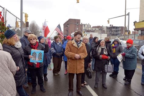 Former Mater Dolorosa parishioners hold Christmas Eve prayer service outside ruins of former ...