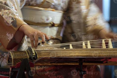 Koto japanese harp 17361474 Stock Photo at Vecteezy