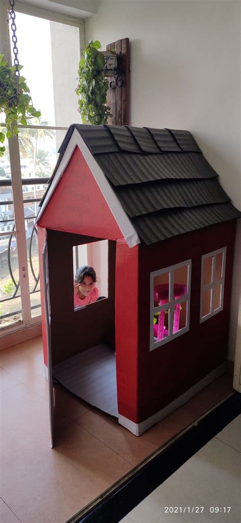 DIY cardboard playhouse | Cardboard house, Cardboard box playhouse diy ...