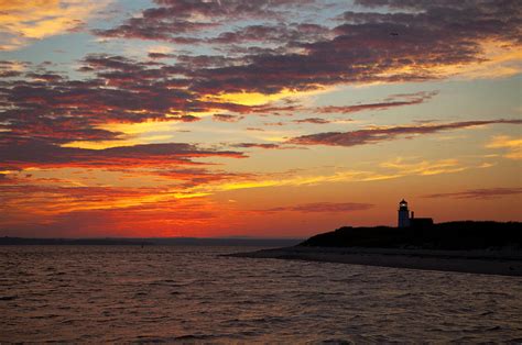 Sunset over Sandy Neck Lighthouse Photograph by Charles Harden | Fine Art America