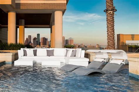 Ledge Lounger: The Ultimate “In-Water” Pool Furniture - Luxury Pools ...