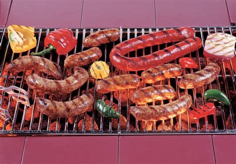 Sausage Assortment on Grill with Veggies - Prepared Food Photos, Inc.