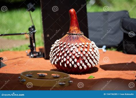 SHekere Authentic African Instrument Outdoor Shaker at Day Stock Image - Image of african ...