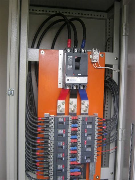 an electrical panel with multiple wires in it