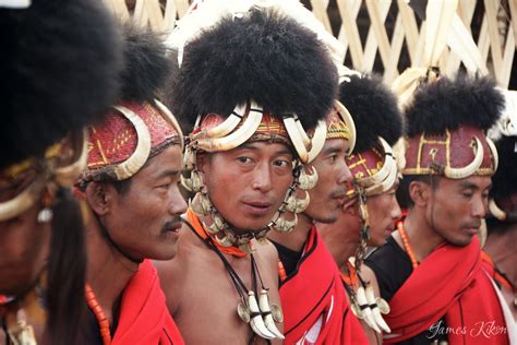 Nagaland Cultural Photos - Khiamniungan Naga men in traditional dress perform folk song and ...