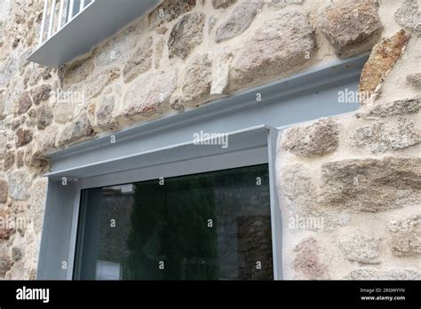 Steel beam lintel of a renovated old house facade. Architecture detail Stock Photo - Alamy