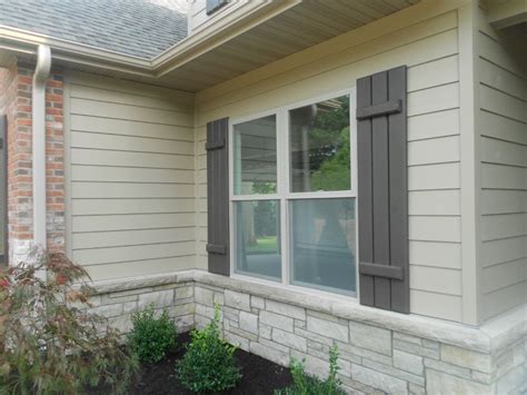 Close-up of the Hardie Window Trim in Khaki Brown | Exterior remodel, Shutters exterior, Hardie ...