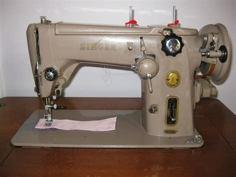 My Grandma's 1957 Singer 306k sewing machine in the original cabinet | Sewing machine, Vintage ...