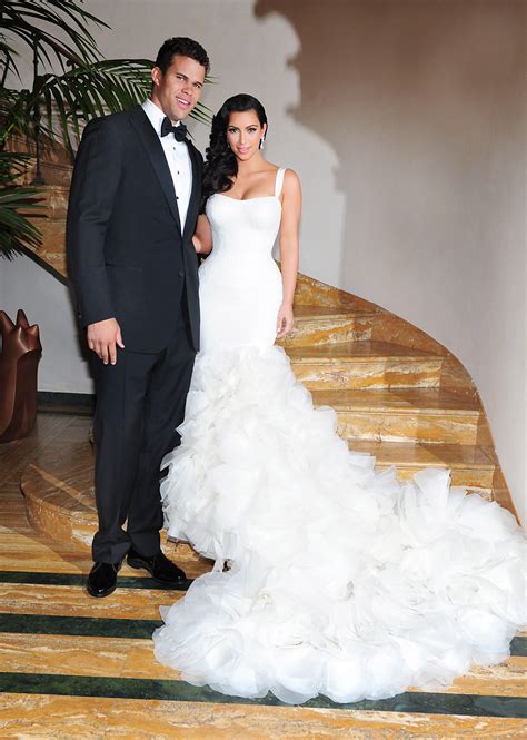 See all of the Kardashian wedding dresses including Kourtney's $1.9K Dolce & Gabbana mini & Kim ...