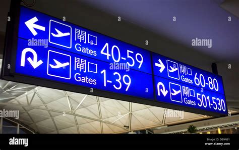 Boarding gates signs in Hong Kong airport Stock Photo - Alamy