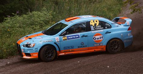 Juha Salo in a Lancer Evo X with Gulf Oil livery at Rally Finland 2010 ...