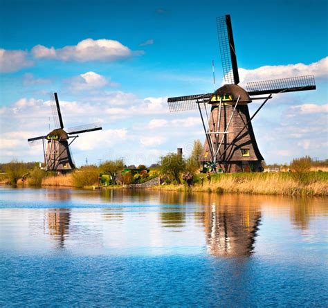 Famous Windmills in Kinderdijk Museum in Holland Stock Image - Image of ...