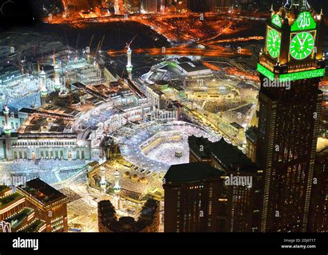 The Great Mosque and inside its courtyard, the "kaaba" cube, and the Mecca Clock Tower (right ...