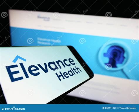 Smartphone with Logo of American Insurance Company Elevance Health Inc. on Screen in Front of ...