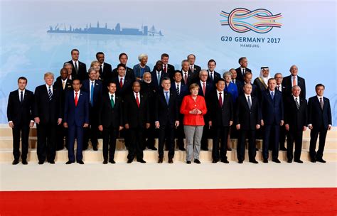 Trump, Merkel, Putin... the gang's all here as leaders pose for 'family photo' at G20 summit