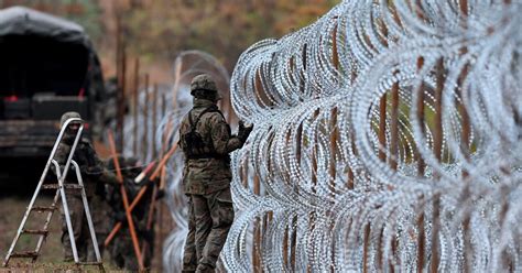 Migrant border crossings rise at Poland-Belarus border | The Seattle Times