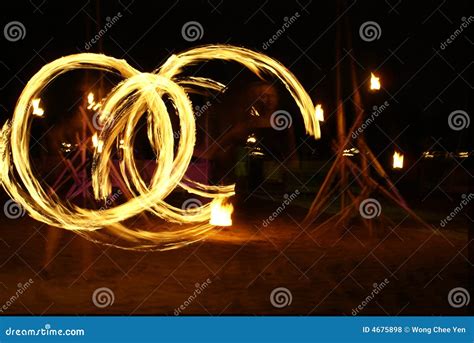 Fire Dancer Silhouette On Sunset Sky Background Stock Image | CartoonDealer.com #43544227