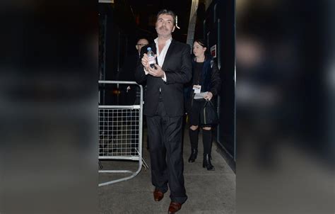 Simon Cowell Steps Out After Health Scare Fall