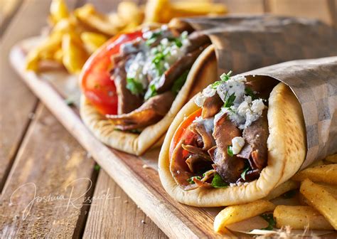 two greek gyros with shaved lamb and french fries | Food, Gyros, Greek gyros