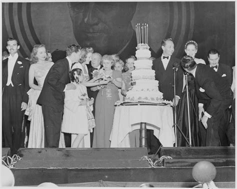 File:Photograph of First Lady Bess Truman distributing birthday cake to Hollywood celebrities at ...
