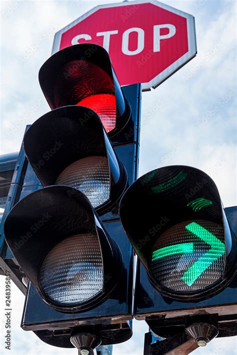 .Red light at the traffic lights with additional section - the green arrow to the right. Road ...