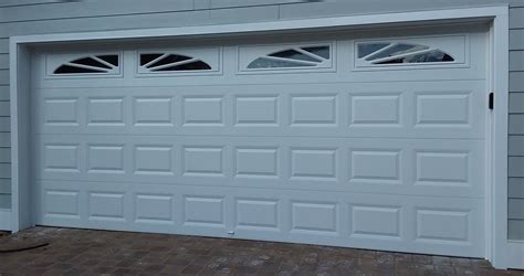 16x7 Model 4206 garage door with Sunburst top glass installed by the Richmond store. # ...