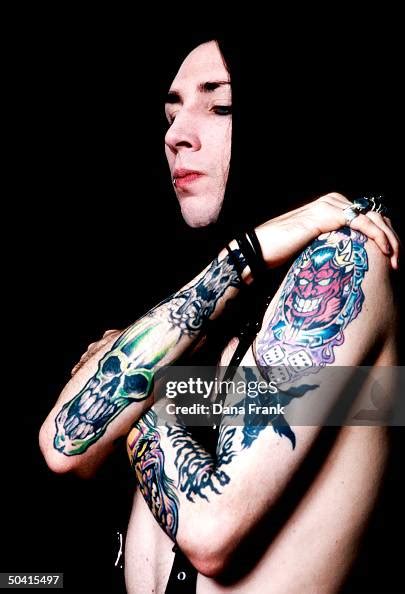 Rock singer Marilyn Manson aka Brian Warner displaying his tattoos ...