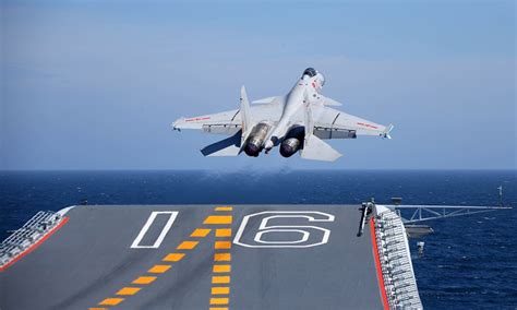 China reveals upgraded J-15 fighter jet; key aircraft carrier roles expected - Global Times