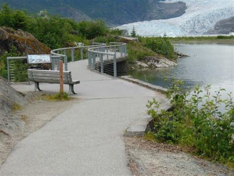 Glacial outburst flooding from Suicide Basin submerges trails around the Mendenhall Glacier ...