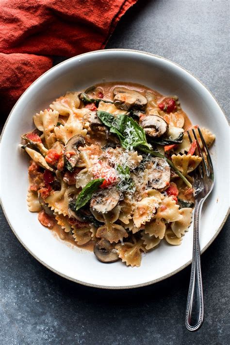 Farfalle Pasta with Mushrooms and Spinach in a Creamy Tomato Sauce — Flourishing Foodie Spinach ...