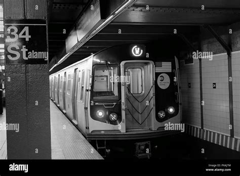 NYC Subway Trains approaching and leaving a subway station Stock Photo - Alamy