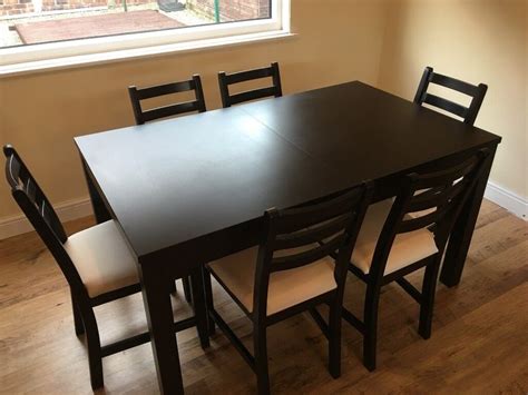 black/brown extendable dining table with 6 chairs bought from IKEA | in Kilmaurs, East Ayrshire ...