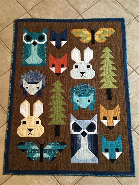 Fancy Forest baby quilt. #lifegoals | Animal baby quilt, Animal quilts, Forest baby quilt