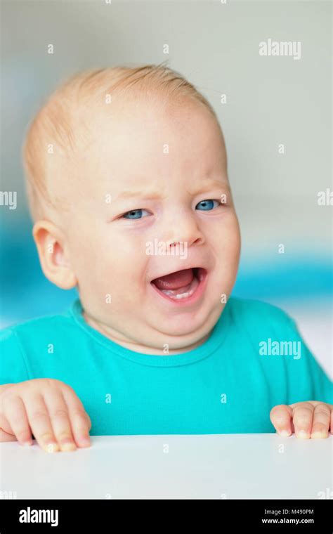 Baby boy with blue eyes Stock Photo - Alamy