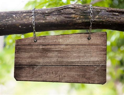 Blank wooden sign board hanging on branch — Stock Photo © Andrey_Kuzmin #45104651