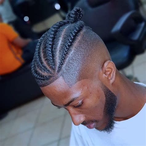 Two Braids With Fade Black Men - A man bun fade is a men's hairstyle that blends two hairstyles ...