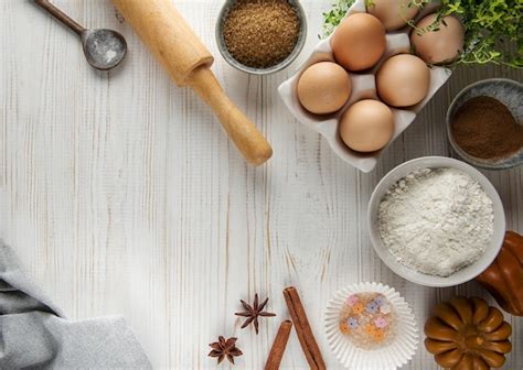 Premium Photo | Dough recipe ingredients on white rural wood kitchen table