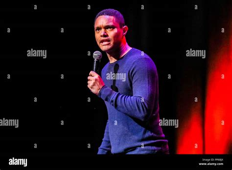 Trevor Noah Performs Stand-up comedy live on tour Stock Photo - Alamy