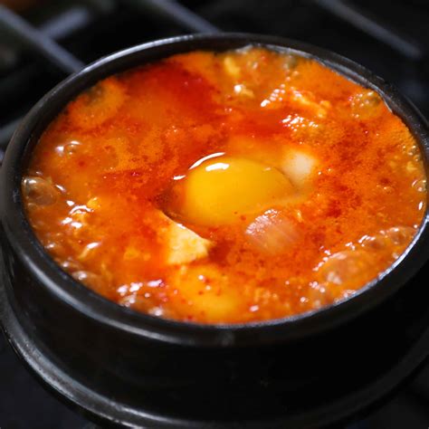 Spicy soft tofu stew with beef (Gogi sundubu-jjigae: 고기 순두부찌개) recipe by Maangchi