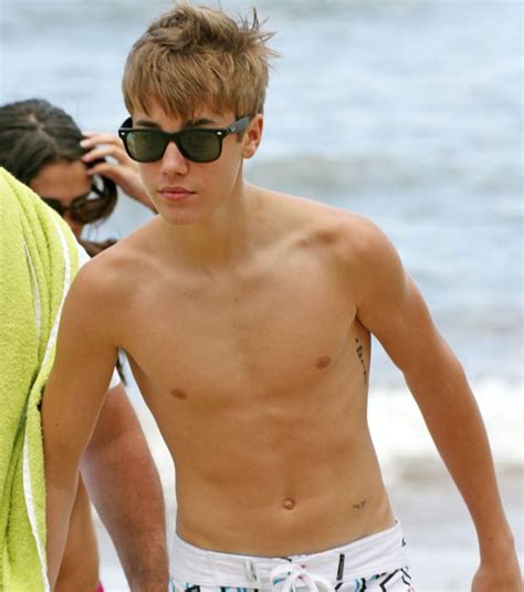 Justin Bieber's Small Bird Tattoo on His Waist / Hip- PopStarTats