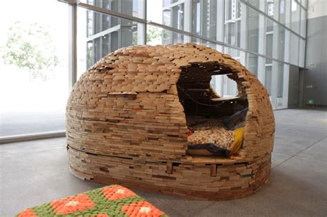 Sleeper Cells: A Cluster of Porcupine-Esque Huts Made from Found Wood